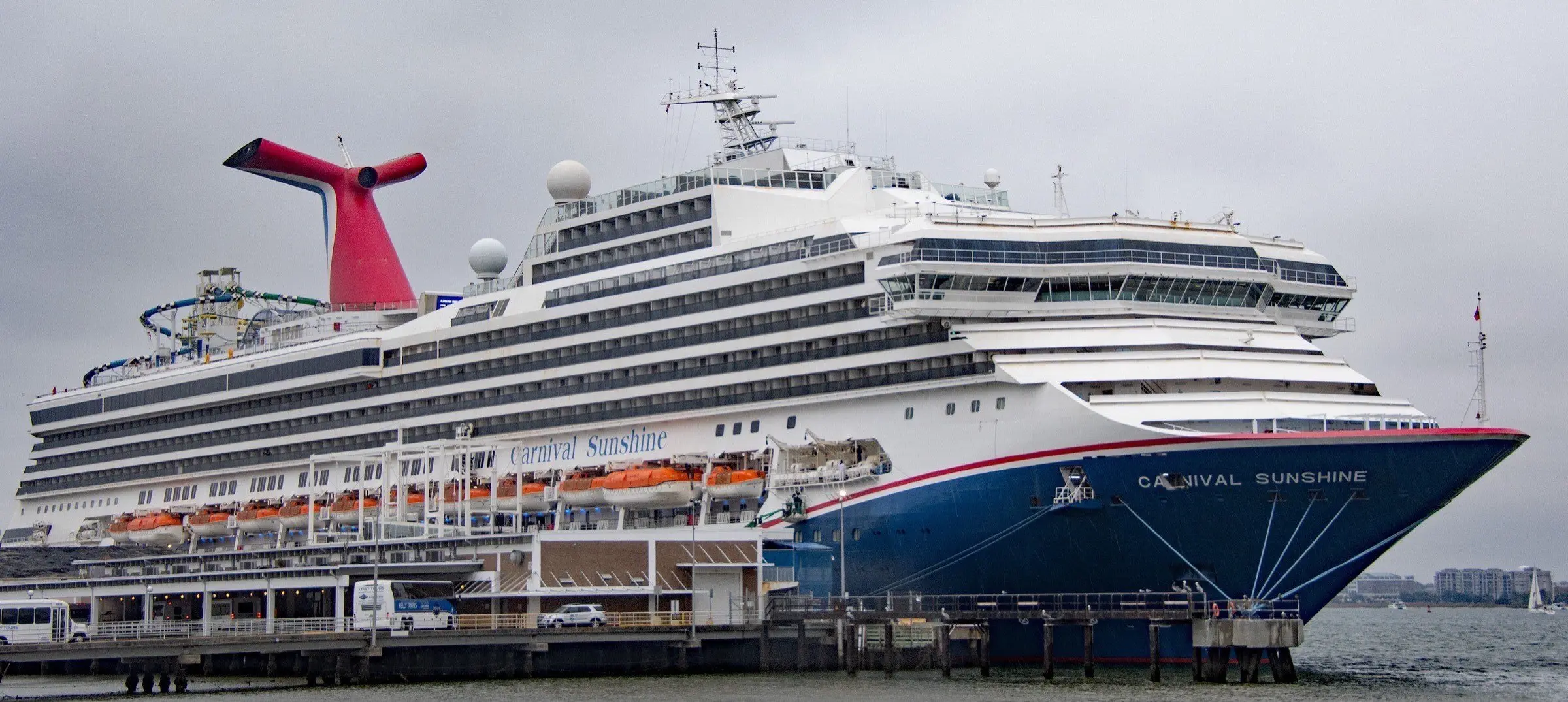 Carnival Sunshine alongside a pier